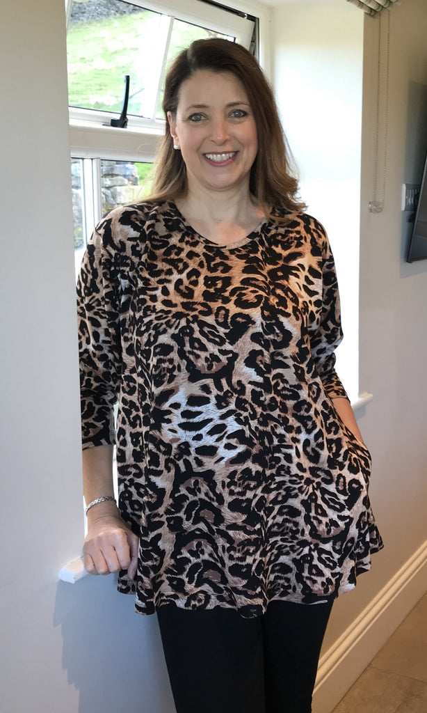 Eva scooped neckline swing top in Animal print