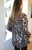 Eva scooped neckline swing top in Animal print