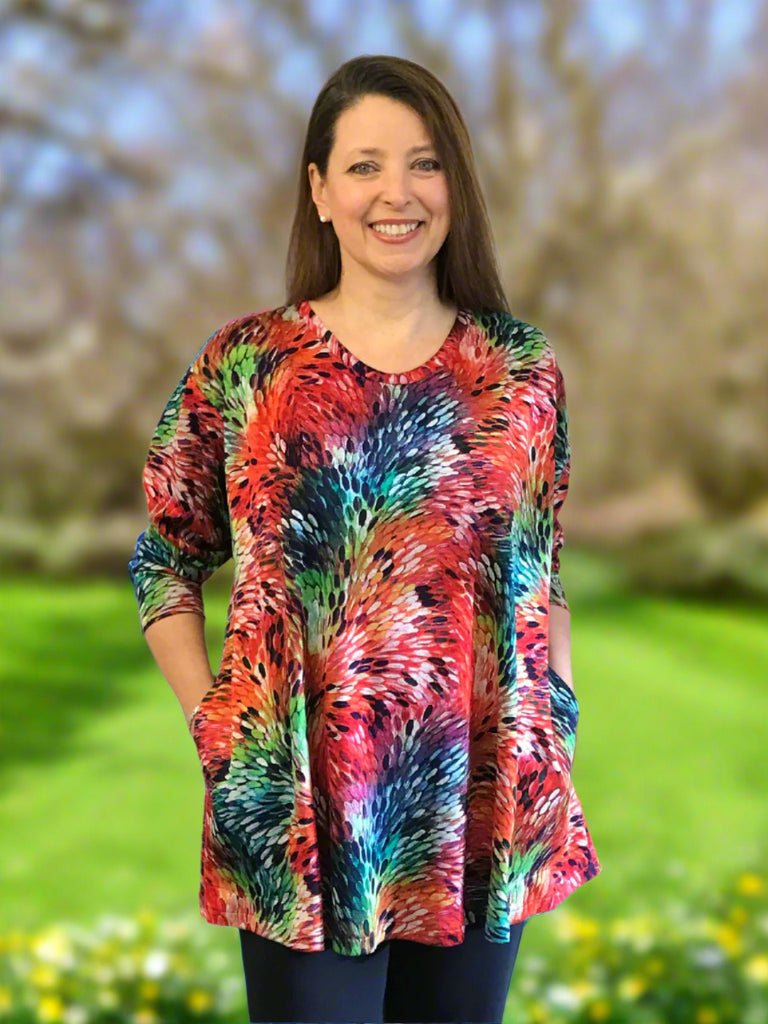 Eva jersey swing top in multi coloured print sizes 14/16  and 16/18 only