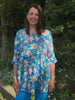 Hampton dolman sleeved top in vibrant turquoise/ pink floral print